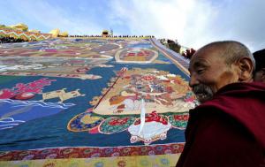 an old monk on sun buddha holiday